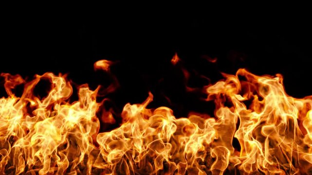 Flames fiery rising movement isolated on black backgrounds