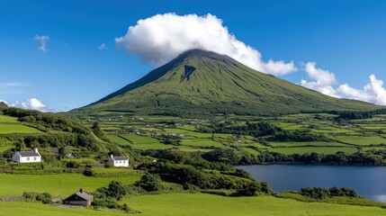 Fototapeta premium Azores Mountain Landscape with Cloud Lush Green Fields and Homes