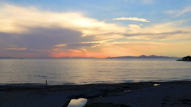 Beautiful colorful sunset on the beach in Kefallinon Greece.