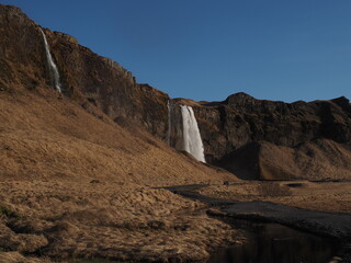 Fototapeta premium Waterfall on rocks - Iceland