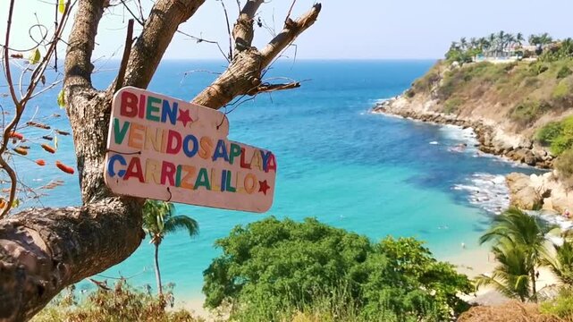 Direction welcome sign to Playa Carrizalillo beach Puerto Escondido Mexico.