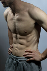 A young shirtless muscluar man