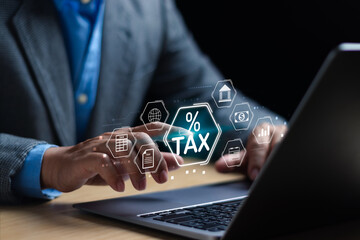 Finance or income management concept in online tax calculation, man tapping on virtual computer...