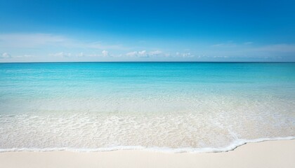 Obraz premium A scenic beach landscape with clear blue waters and white sand, captured in a natural, relaxing style