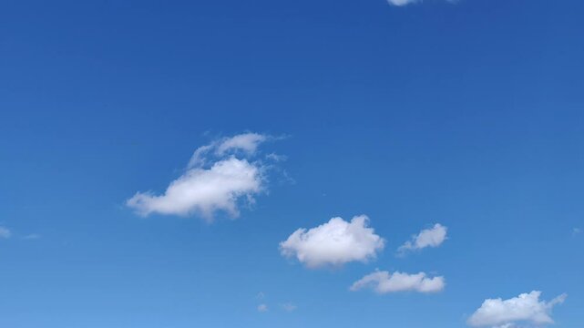 Very dense white small clouds at midday