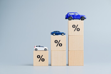 A chart made from wooden blocks showing the growth of different types of cars