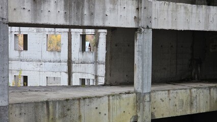 concrete walls of an abandoned factory