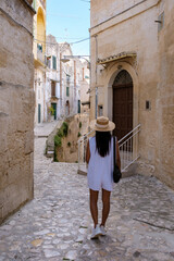 Exploring the charming streets of Matera, Puglia in the warm sunshine of a beautiful day