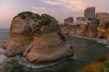 Obraz premium Beirut city with famous Pigeons' Rock (Raouche rocks) on the Mediterranean sea coastline with modern architecture in Lebanon. 