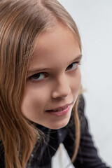 Portrait of curious girl expressing emotion and wonder