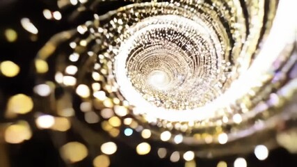 Twinkling sparkles spiraling upward