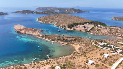 Obraz premium Aerial drone photo of paradise island with crystal clear turquoise beaches and main seaside town of Arki or Arkoi, Dodecanese, Greece