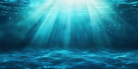 Underwater background with light rays shining through the water surface, creating an atmosphere of tranquility and depth. The blue color scheme adds to its serene charm.