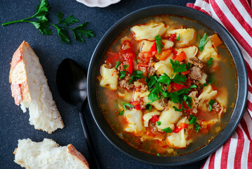 Central Asian vegetable soup with small dumplings.style hugge.selective focus