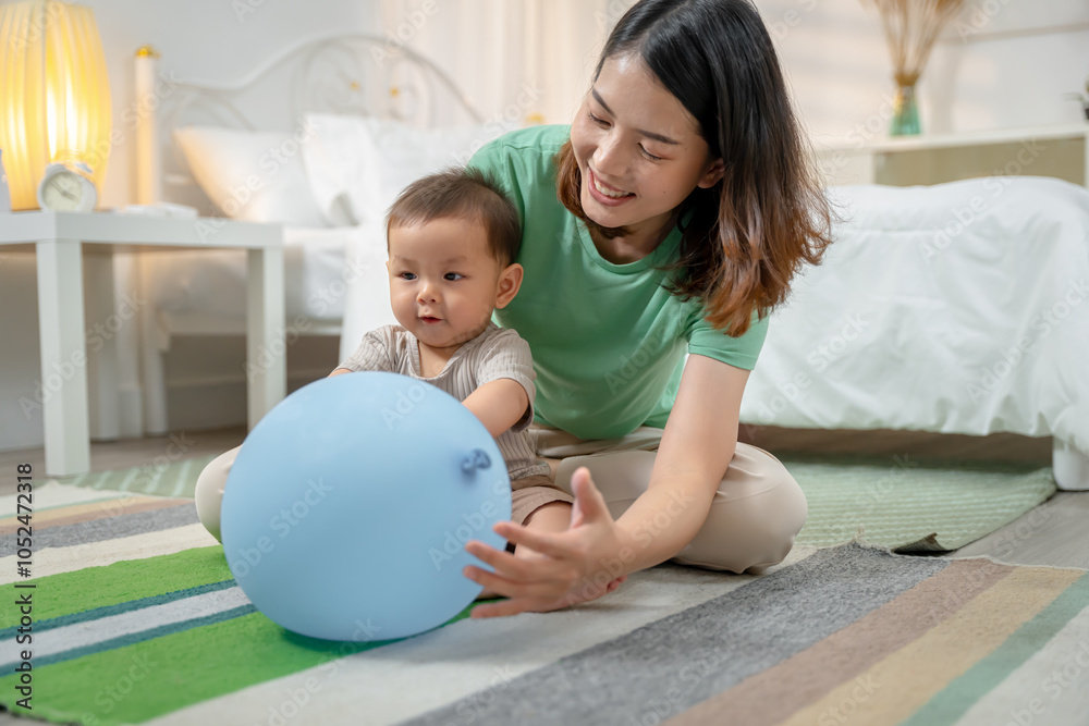 Wall mural asian baby and woman doing lifestyle activities together at home.