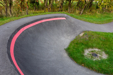 Naklejka premium An empty BMX or skateboarding pump track