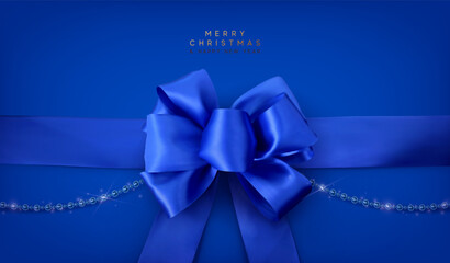 Christmas realistic blue satin ribbon and bow, string beads. Gift bow template. Xmas banner, web poster, design for flyer, brochures, holiday invitations. Happy new year gift card. Vector illustration