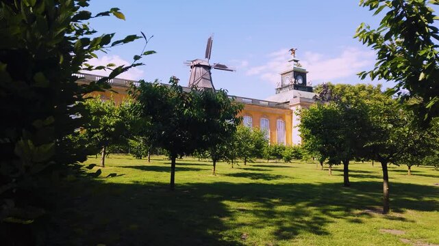 German Culture - Sanssouci Landmark in Potsdam near Berlin - Summer residence of Prussian King Frederick the Great - Old Palace and Mill Buildings - Sunny Day