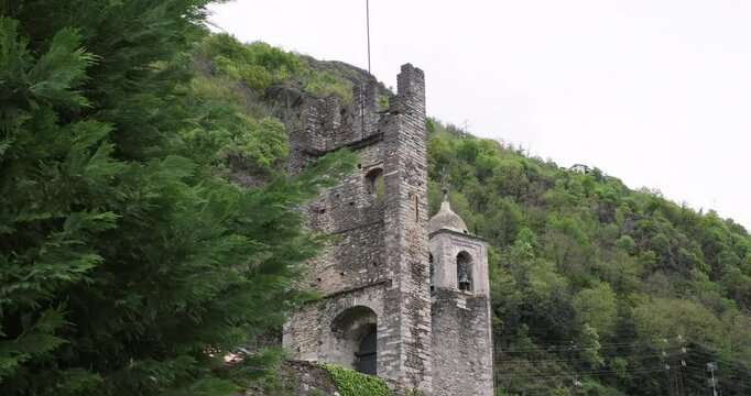 Castle of Corenno Plinio in the woods. Lake Como, Dervio, Italy. Town attraction. Travel destination, vacations in Italian Alps