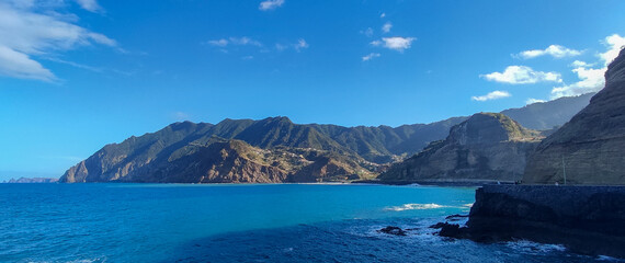 Coastal cliff scenery with turquoise ocean and dramatic cliffs in Madeira, Cais do Porto da Cruz