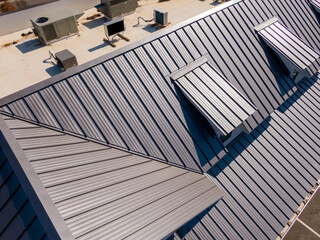 Fototapeta premium Sunny Daytime Drone Images of New Standing Seam Metal Roof on a Commercial Building