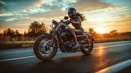 Obraz premium Woman riding motorcycle on scenic sunset highway journey