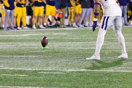Close-up of a College football kicker on the football field