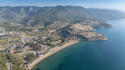 Fototapeta premium Aerial view over Ahmetbeyli coastal resort town in Menderes district of Izmir province in Turkey.