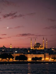 Obraz premium Golden Horn at night with a mosque skyline in pink.