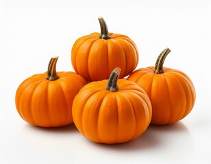 Obraz premium A collection of small, vibrant orange pumpkins, isolated on a white background