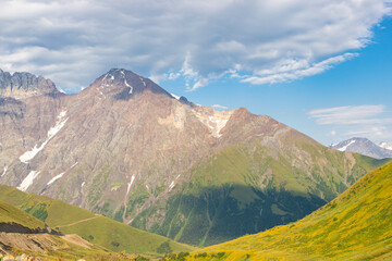 Naklejka premium Scenic summer view of Zagar Pass, a high mountain pass at an elevation of 2.620m, from Ushguli in Upper Svaneti To Sasashi village in Lower Svaneti, Racha-Lechkhumi and Kvemo Svaneti region of Georgia