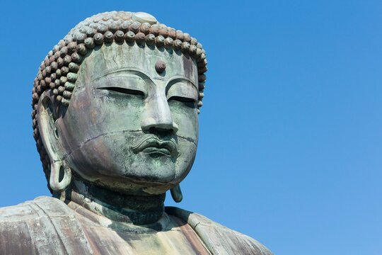 Close up of Big Buddha Statue in Kamakura, Japan.