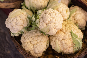 Fresh and Colorful Cauliflower Display at the Market Stall