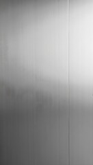 Sleek brushed stainless steel wall with modern industrial look