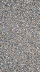 Textured gravel path in gray white beige hues