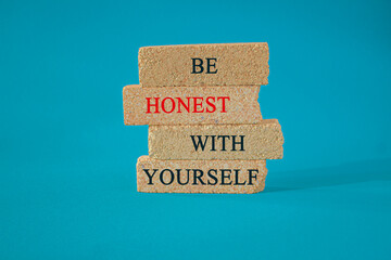 Naklejka premium Be honest with Yourself symbol. Brick blocks with words Be honest with Yourself. Beautiful blue background. Be honest with Yourself concept.