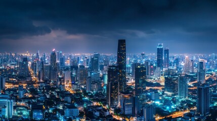 Naklejka premium Night View of an Urban Cityscape with Bright Lights