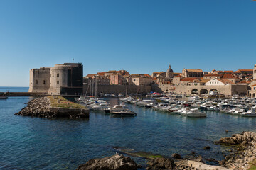 Fototapeta premium Dubrovnik yacht port in the old town with a fortification