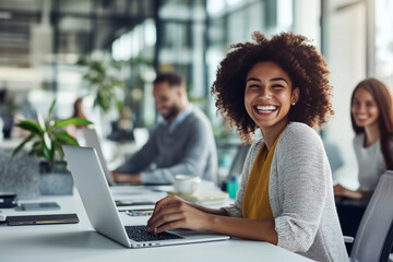 Happy Woman Smiling at Work in a Modern Office Setting