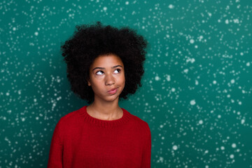 Photo portrait of pretty pupil girl look thoughtful skeptical empty space wear trendy red knitted...
