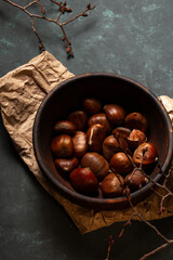 Edible chestnuts in a wooden bowl