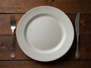Empty plate on a wooden table