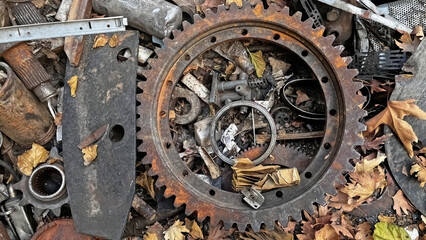 An old gear or gearwheel in the scrap yard.