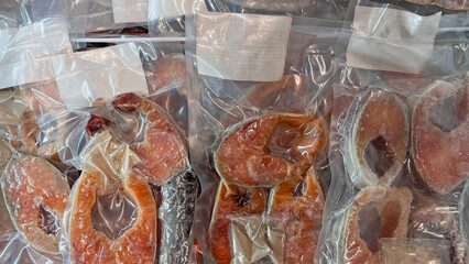 Sliced and vacuum-sealed fish from the freezer in the supermarket.