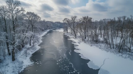 Naklejka premium Serene Winter Landscape with Frozen River and Trees