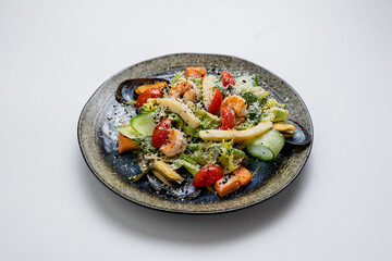 Gourmet seafood salad with mussels, shrimp, avocado, and cherry tomatoes, topped with grated cheese