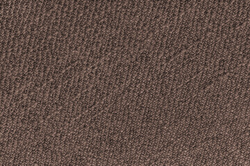 Brown Jacquard fabric with diagonal woven, coarse weave texture upholstery cloth. Textile background, furniture textile material, wallpaper, backdrop. Cloth structure close up, macro.