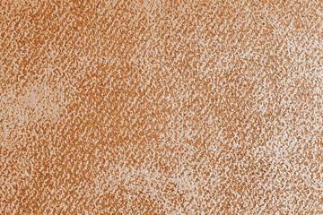Detailed view of orange grunge shabby jeans denim fabric texture. Closeup, macro of diagonal...