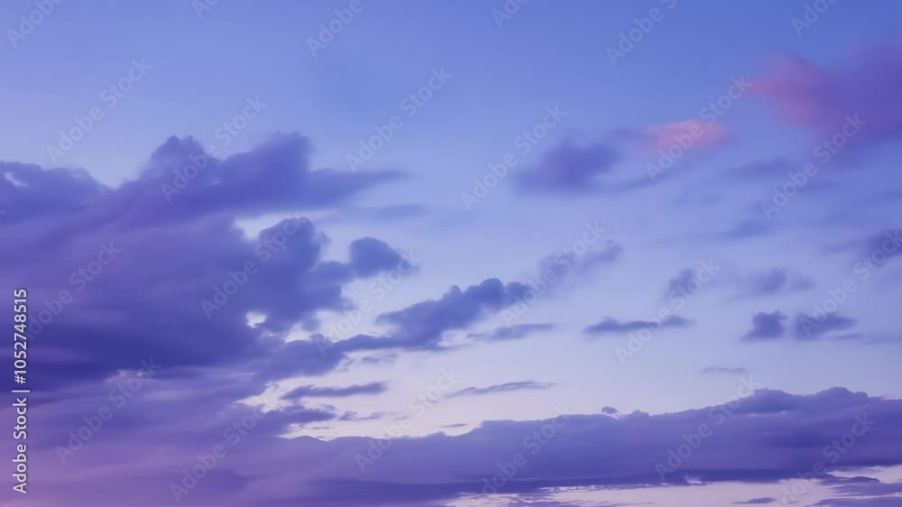 Aufkleber clouds are morphing in a surreal purple sky. the color palette and cloud formations evoke a sense of