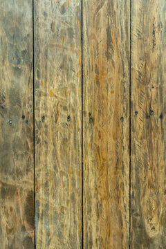 Weathered wood planks backdrop with screws, beautiful texture 